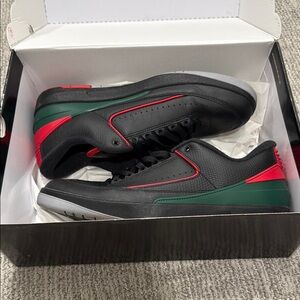 Jordan Low 2’a Black and Red. Size 12.5. Great condition.